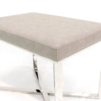 Banc en similicuir avec piètement en acier inoxydable et mousse haute densité
